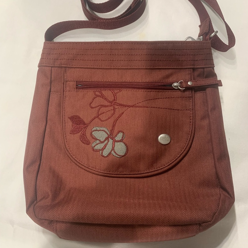 Haiku jaunt RFID blocking travel crossbody bag